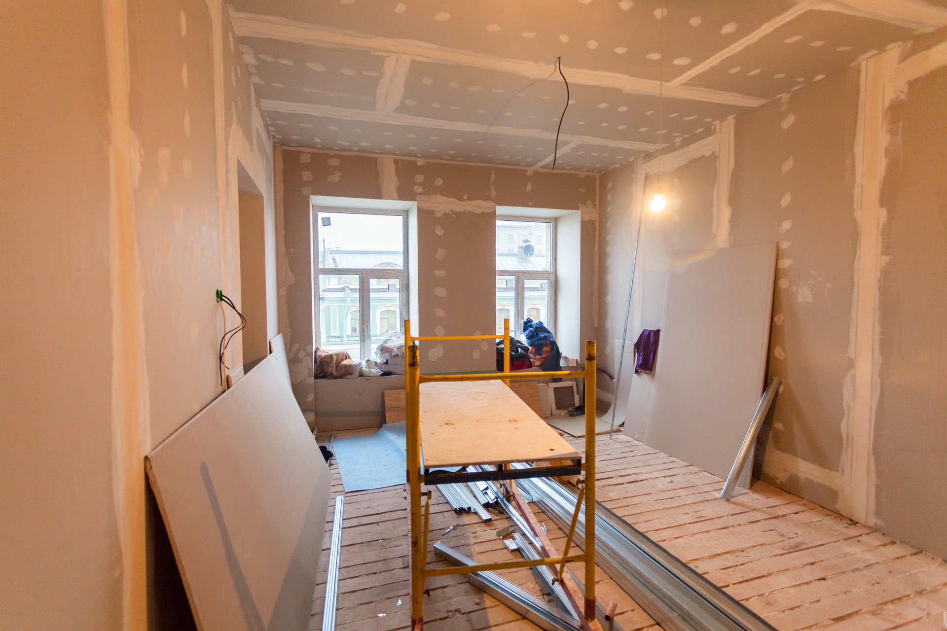 Material for repairs in an apartment is under construction, remodeling, rebuilding and renovation. Making walls from gypsum plasterboard or drywall.