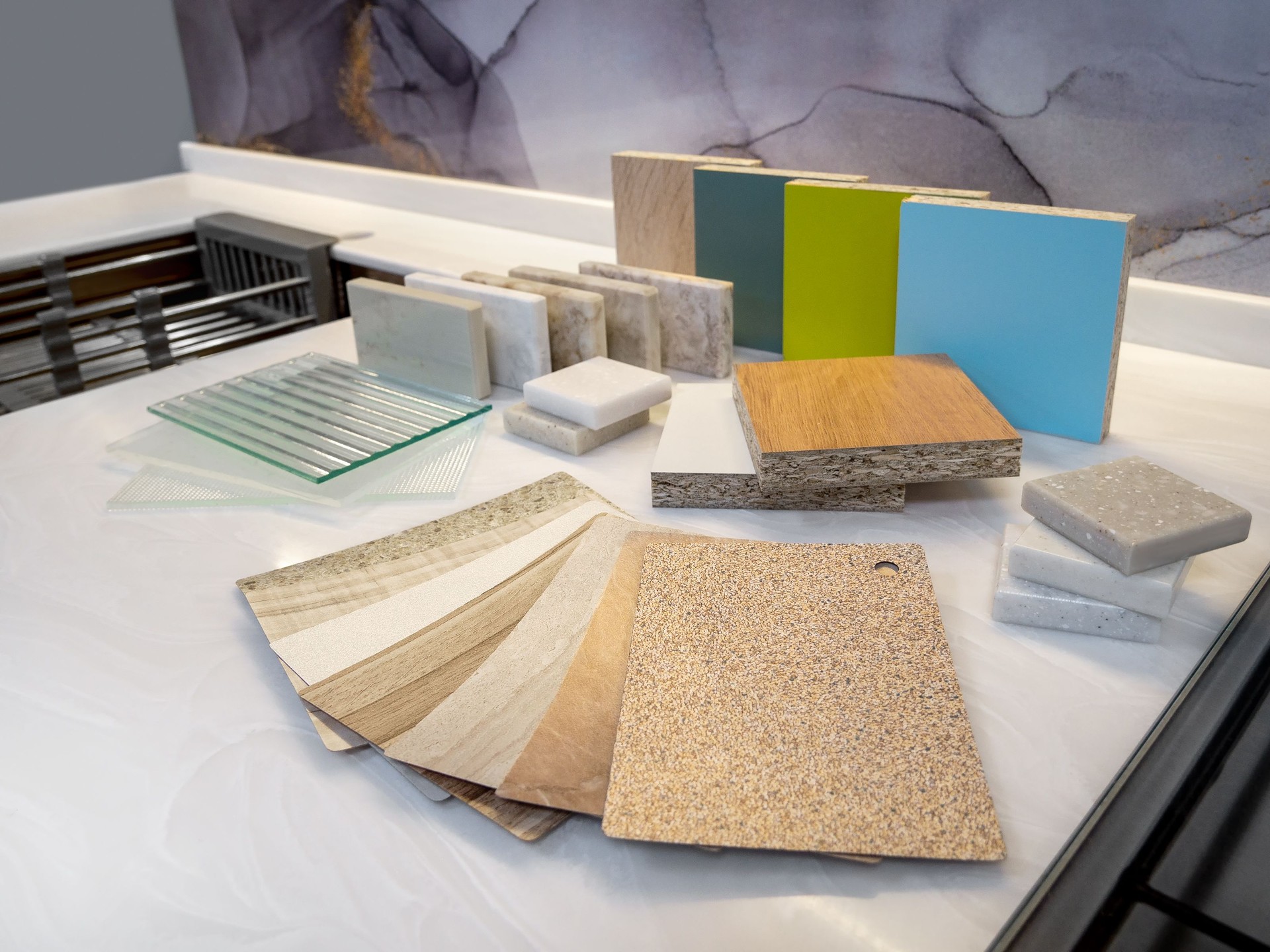 Catalog of samples of materials for kitchen countertops, facades made of artificial stone, plastic, laminate and chipboard. Furniture production.