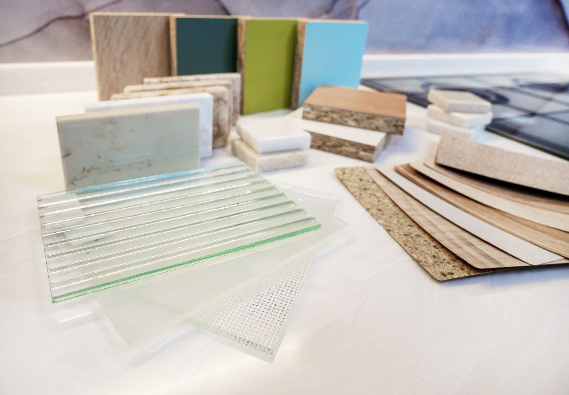 Catalog of samples of materials for kitchen countertops, facades made of artificial stone, plastic, laminate and chipboard. Glass for facades. Furniture manufacturing.